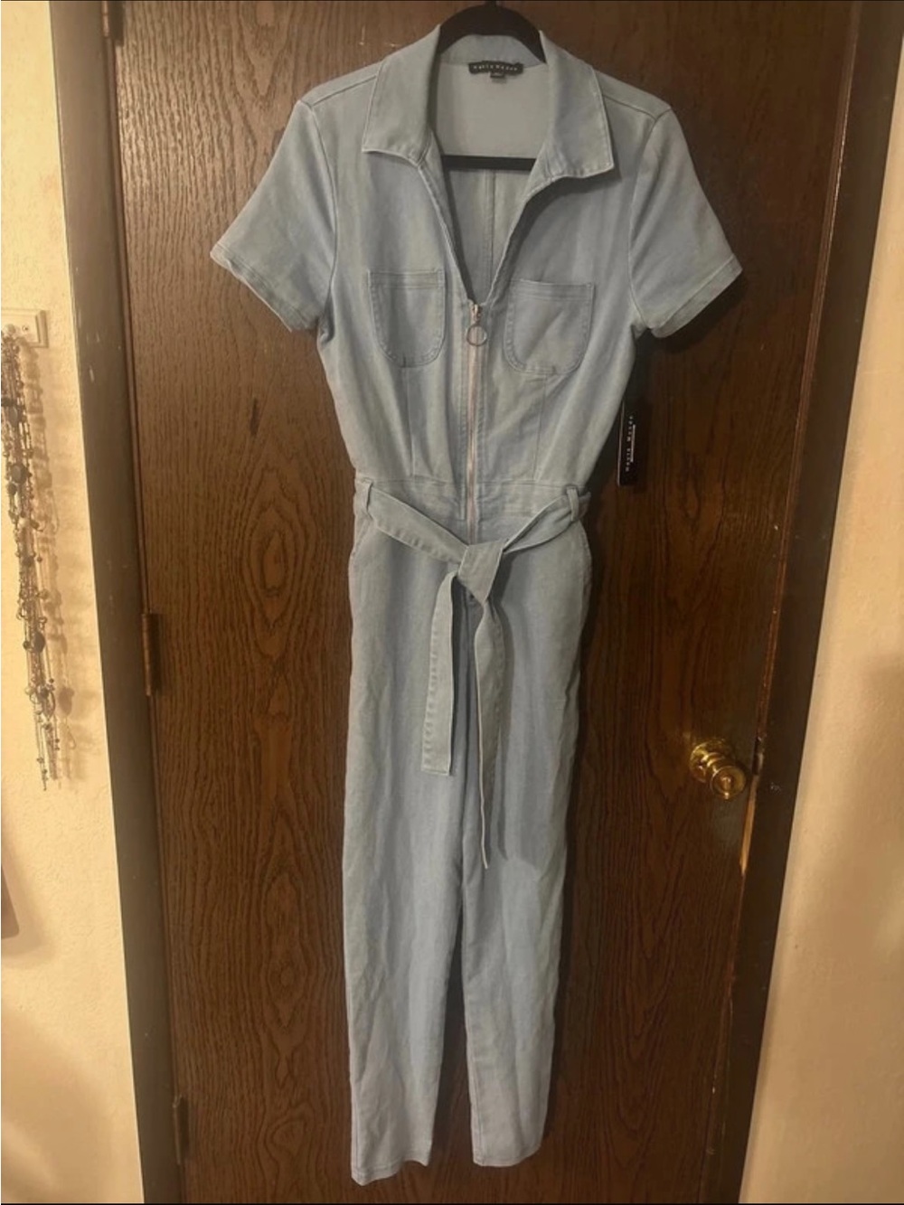 NWT Haute Monde Light Blue Denim Jumpsuit with Tie Waist. Size M.